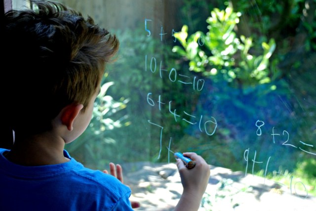 Maths on our sliding doors using our STABILO 3-in-1 pencils. A fun way for the kids to practice maths at home
