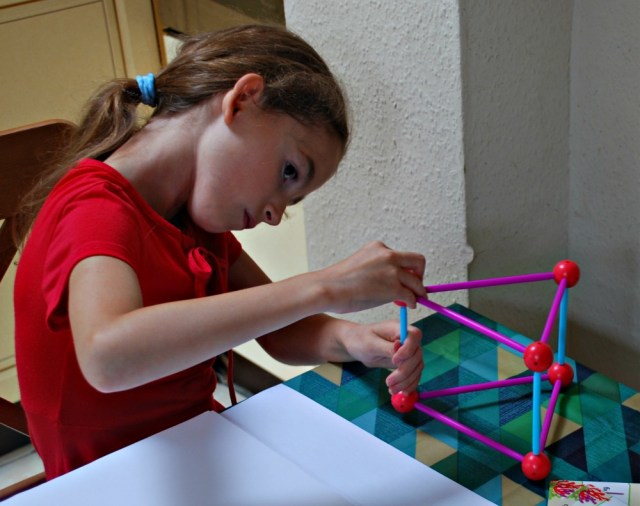 Helping kids to draw 3D shapes, first they build the shape using their Dive Into Shapes set