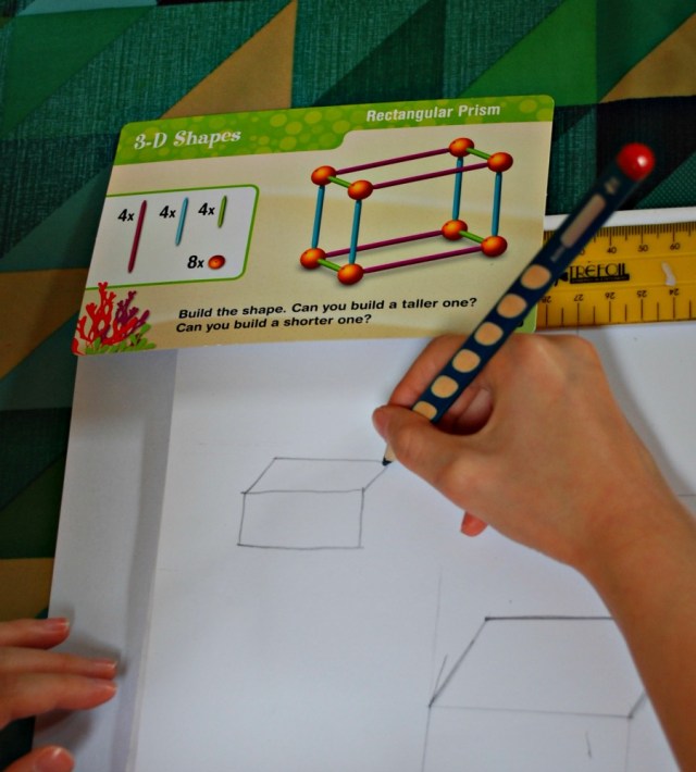 Practicing drawing a Rectangular Prism using our Dive Into Shapes cards