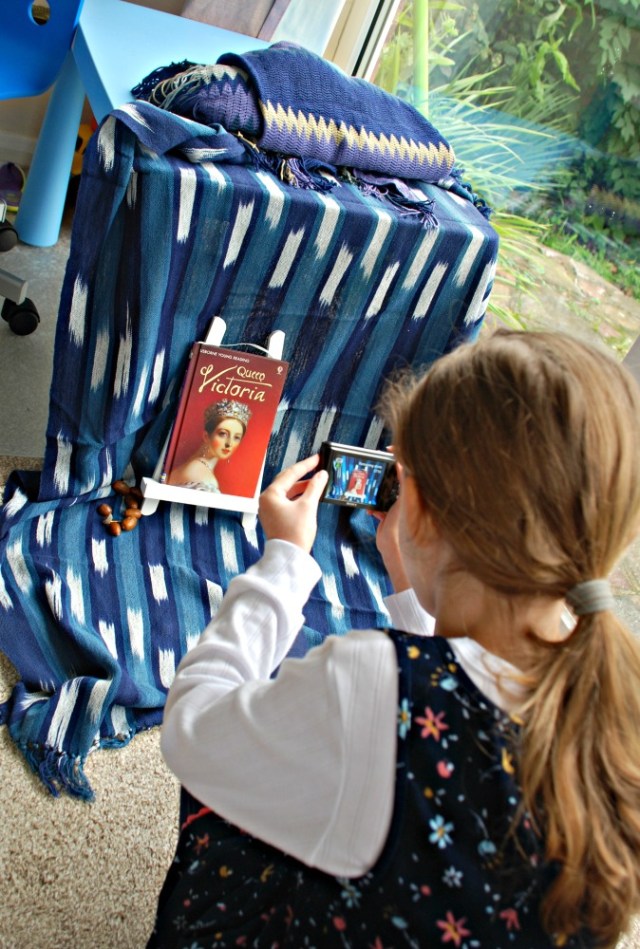 Practicing her staging her photographs