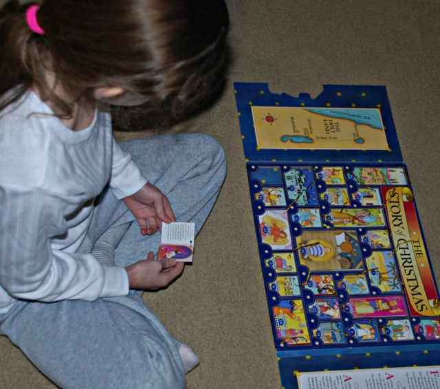 Reading the booklets out of the Story of Christmas book set