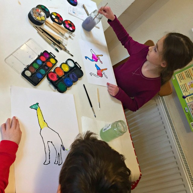 Busy painting some rainbow African animals