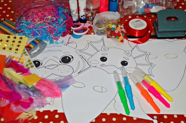 Crafting with kids. Use the printable masks from Activity Village and let the kids create
