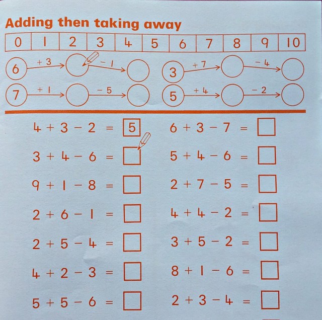 Schofield & Sims Number 2 Maths workbook. Adding then subtracting. Maths practice for key stage 1