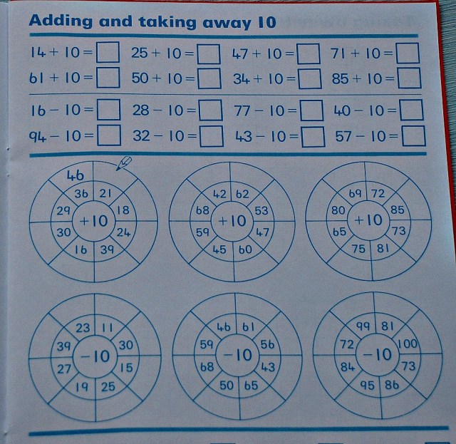 Schofield & Sims Number 4 book. Lots more addition and subtraction practice. Key stage 1 maths practice
