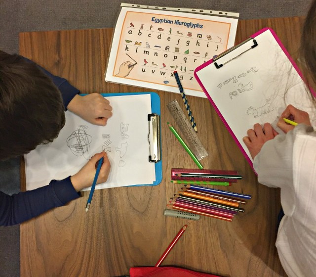 Practicing writing hieroglyphs while visiting the British Museum