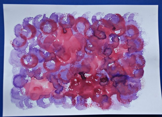 Creating colourful paper to use in art projects with our watercolours and paint dabbers