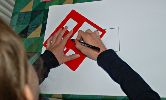 Using our Learning Resources shape stencils to draw an angle picture