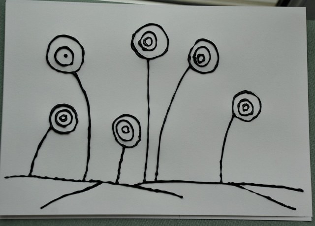 Dimensional Paint outline for some circular flowers