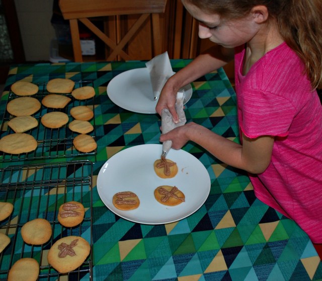 Experimenting with using an icing bag and some icing tips for the first time