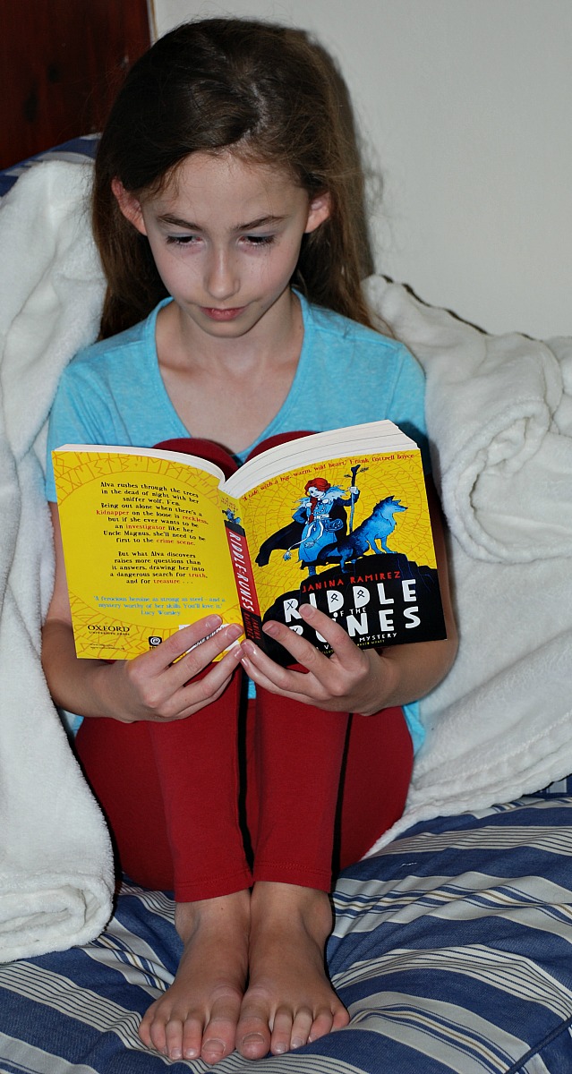 Reading the Ridlle of the Rune written by Janina Ramirez. A brilliant Viking story about a strong female character