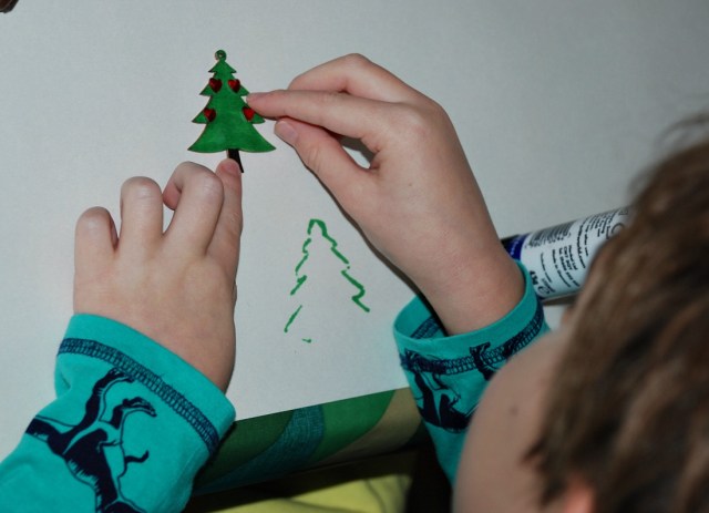 adding some crafting jewels onto some of the Tiger Christmas ornaments