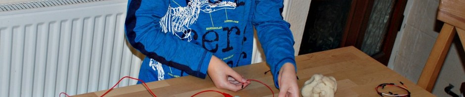 Creating circuits with his DIY Electro Dough Kit