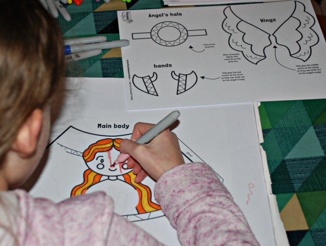colouring in the angel from the Mrs Mactivity cone toy set