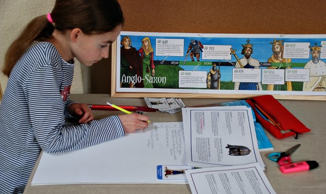 creating her Anglo-Saxon Monarchs Timeline using Twinkl Resources pages