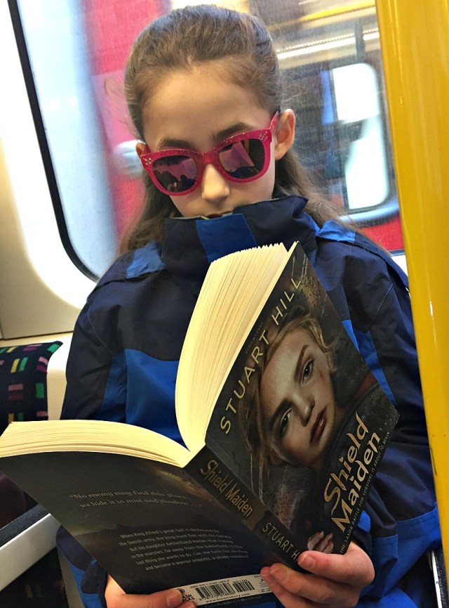 reading her Anglo-Saxon story. Shield Maiden on the train
