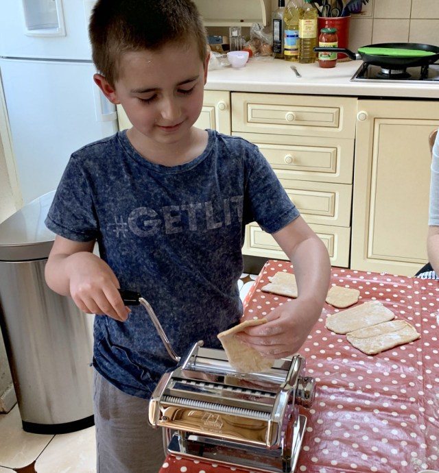 making our own pasta. ofamily learning together